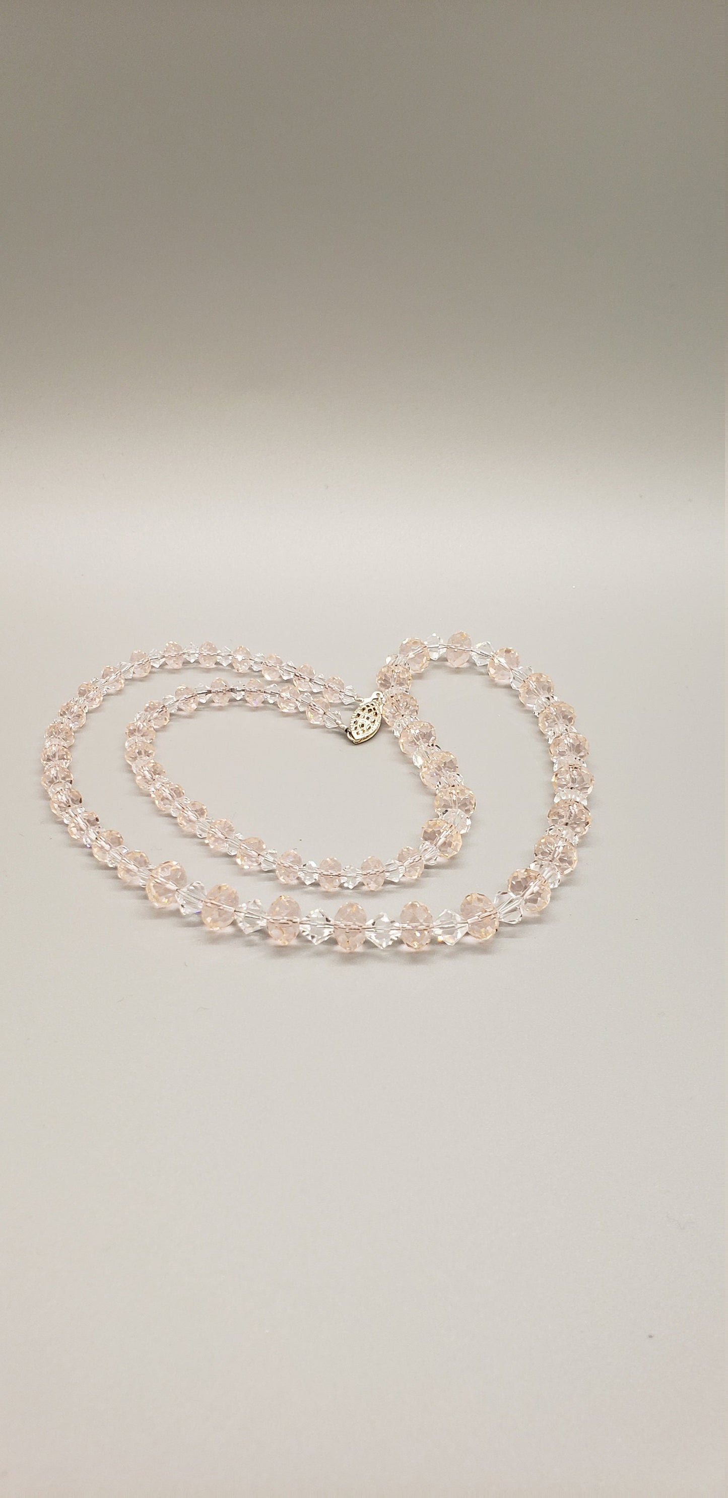 Genuine Pale Peach Swarovski Briolette and Crystal bi-cone beads with sterling filigree clasp