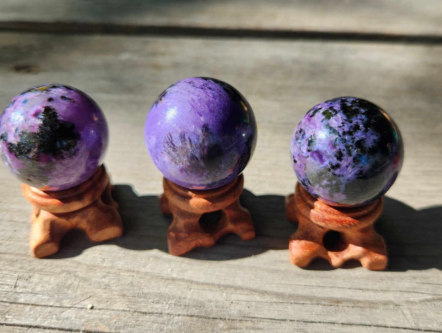 Small but Powerful Charoite Energy Spheres with Wooden Stands